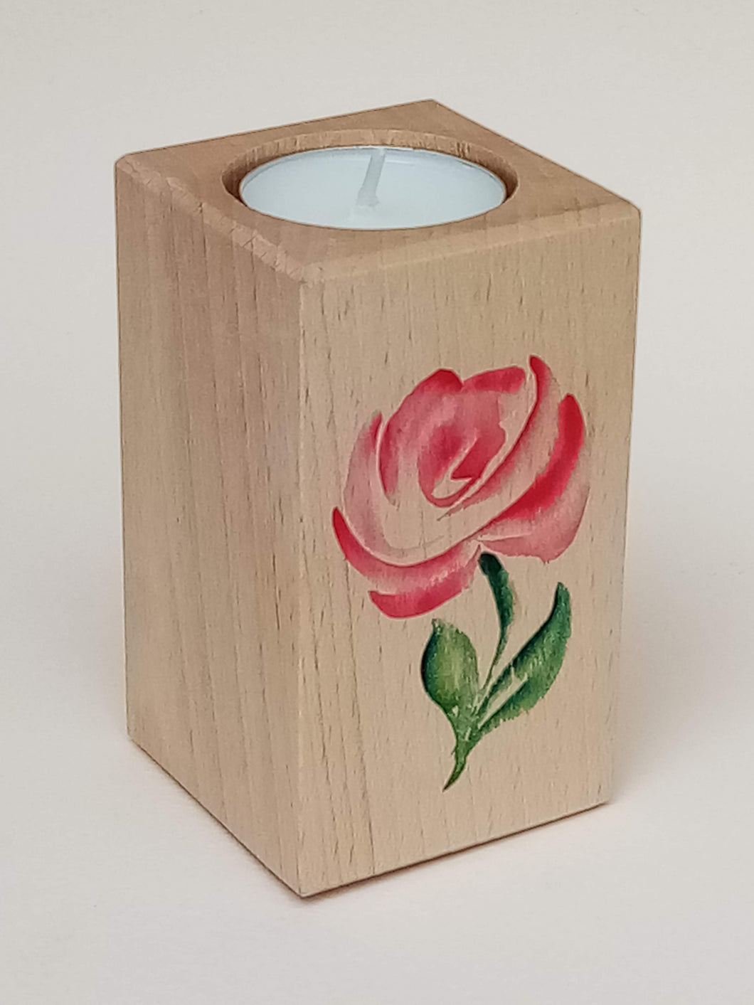 Bespoke solid beech tealight holders.